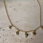 Cadena Conchas Doradas