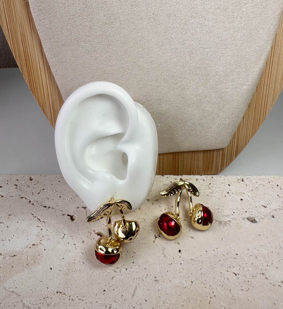 9761-topos-cherry-glow-oruga-azul-joyeria Topos Cherry Glow - Image 1